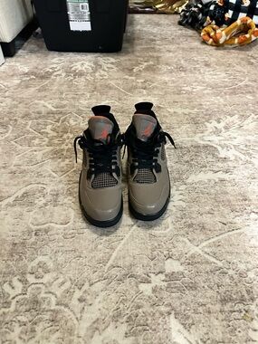 Jordan 4s Men's Taupe and Black Retro Sneakers with Orange Jumpman